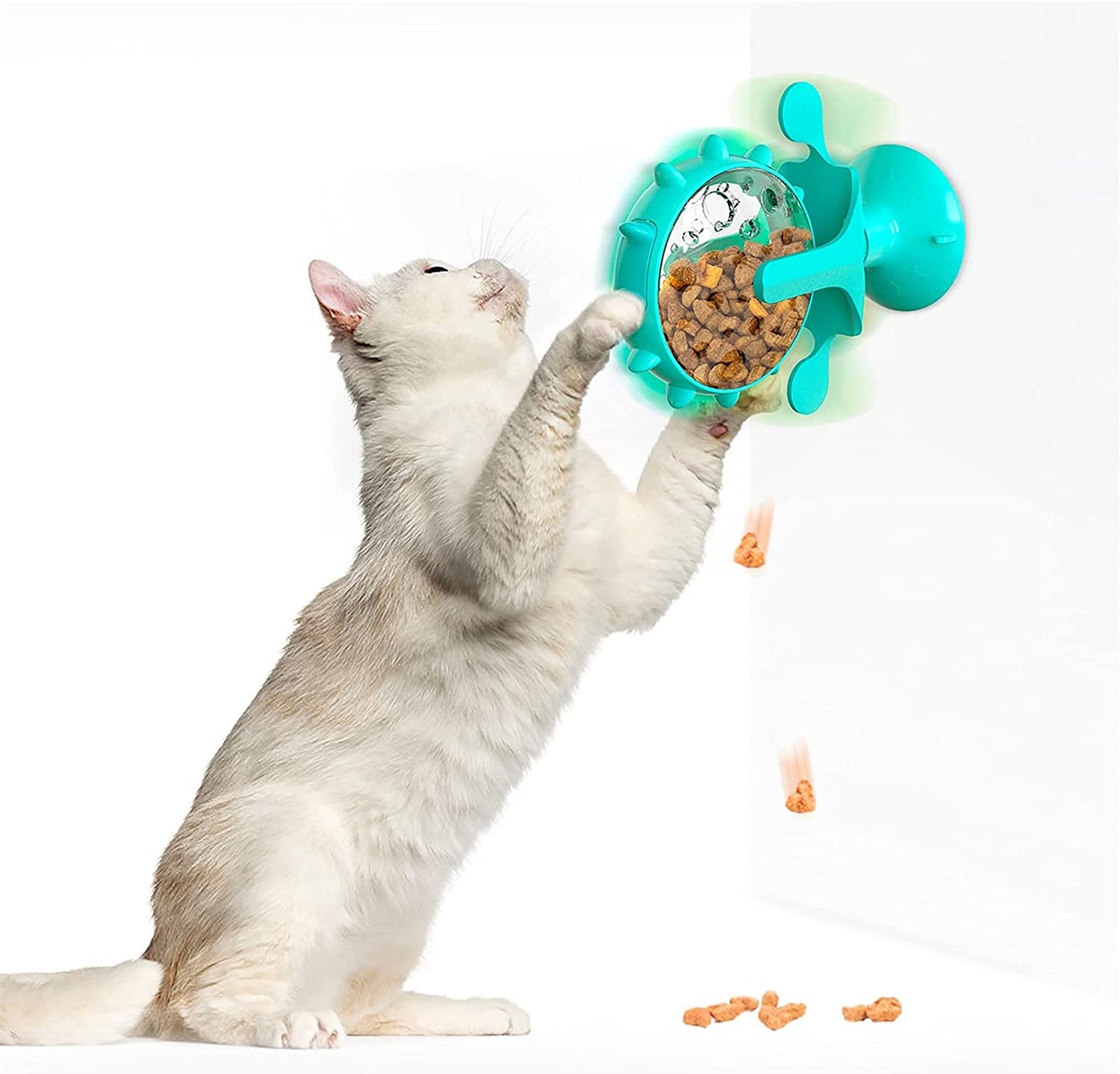 Turntable leaking cat feeder